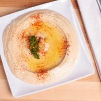 Pita & Hummus · Garbanzo beans blended with garlic, lemon juice, tahini and extra virgin olive oil. Served w...