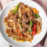 Drunken Noodle · Stir-fried flat noodles in spicy garlic sauce with Thai chili, red bell pepper, onions, carr...