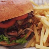 Bbq Bacon Burger  · Topped with melted Gouda cheese, grilled red onions, crisp bacon crumbles, and signature BBQ...
