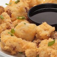 Cauliflower Bites · Fresh cauliflower, beer battered with our California Gold and fried to a golden brown. Garni...