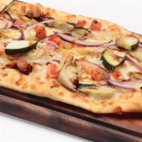Roasted Veggie Flatbread · Brushed with our garlic olive oil sauce, topped with Mozzarella, zucchini, tomato, red onion...