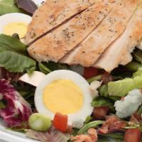 California Cobb Salad · Spring mix blend tossed with Gorgonzola cheese, tomatoes, green onions, mushrooms, hard-boil...