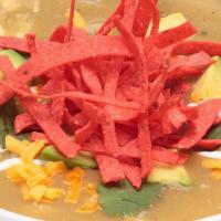Chicken Tortilla Soup - Cup · Enjoy this south-of-the-border family classic, topped with Cheddar, diced avocado, tortilla ...