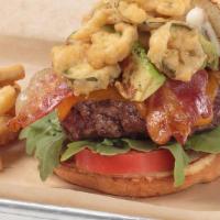 Baecation Burger · Topped with cheddar, crispy applewood smoked bacon, crispy fried jalapeño, sliced tomato and...