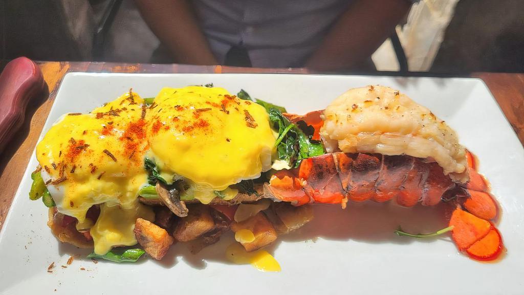 Lobster Eggs Benedict · 6 oz Maine Lobster tail, sautee veggies, housemade lemon hollandaise sauce, cage free poached eggs on multigrain with potatoes

Consuming raw or undercooked meats, poultry, seafood, shellfish and eggs may increase your risk of foodborne illness.
