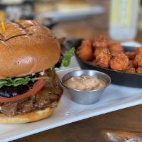 Black & Blue Burger · Angus beef, seasoned with Cajun spice, beer braised onion, mix green, tomato, garlic aioli, ...