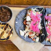 Mahi Tacos · Wild Mahi Mahi sautéed with achiote sauce, horseradish cream slaw, pickled red onion pico de...