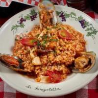 Risotto Del Mare · Riso italiano, shrimp, scallops, mussels, clams, calamari, cherry tomatoes, white wine, and ...