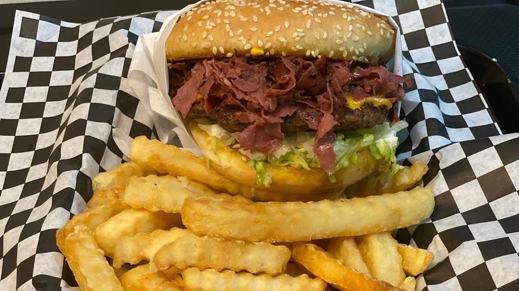 Pastrami Cheese Burger · Single Season Patty 1/4 lb, & pastrami  on toasted  bun. With mayo, mustard, and ketchup. Has veggies of lettuce, tomatoes and onions.