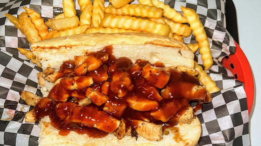 Bbq Chicken · Toasted hoagie, smoked chicken covered in homemade BBQ sauce & grilled onions.
( Includes fries & drink )