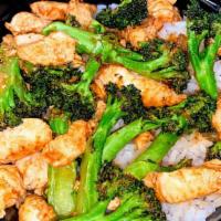 Chicken & Broccoli · Marinated chicken & broccoli over white rice.
