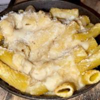 Skillet Mac ' N Cheese · rigatoni, parmesan, white cheddar, truffle oil, breadcrumbs veg