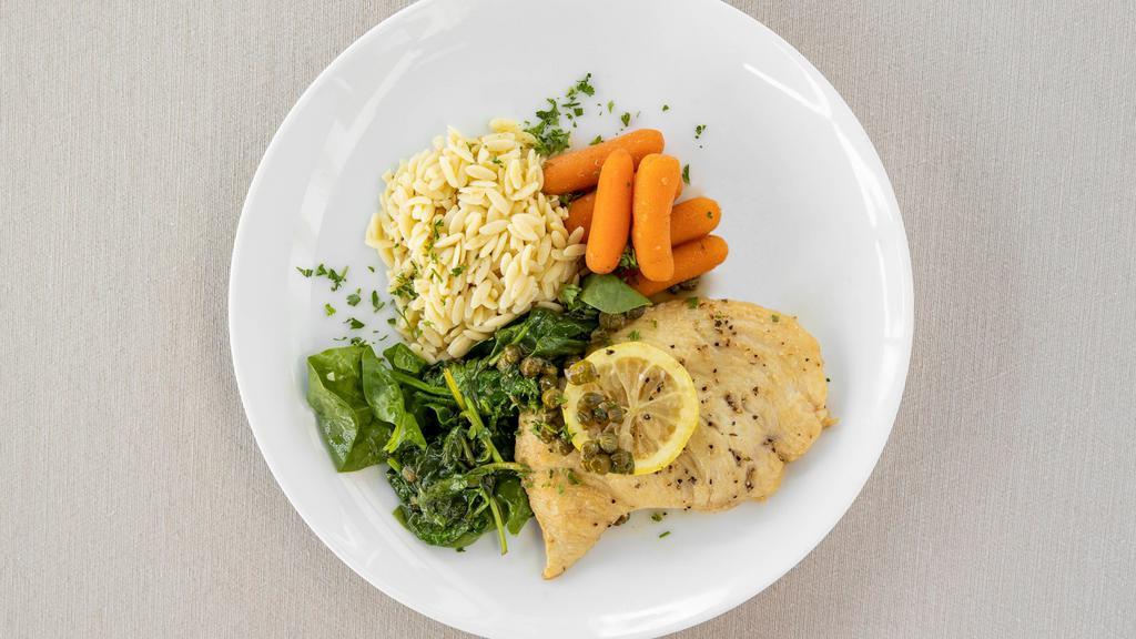 The 'Grille' Chicken Piccata · sautéed chicken breast with lemon, capers, white wine and garlic sauce served with orzo and chef's veggies
