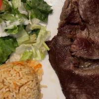 Carne Asada · Thin grilled sliced steak. Served with rice and tortillas.