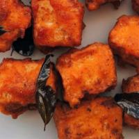 Paneer 65 · Paneer cubes marinated in exotic spices and deep fried. Served with mint chutney.