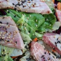 Seared Ahi Tuna Steak Salad · Crispy Lettuce & Spring Mix Topped with Seasoned & Seared Ahi Tuna Steak served with Our Spe...