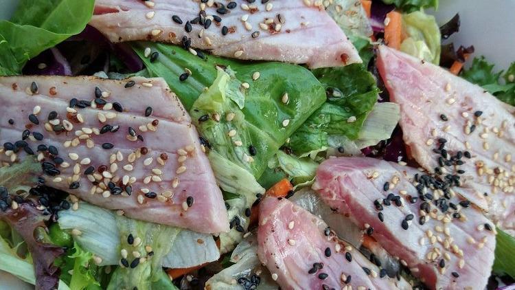 Seared Ahi Tuna Steak Salad · Crispy Lettuce & Spring Mix Topped with Seasoned & Seared Ahi Tuna Steak served with Our Special Dressing.