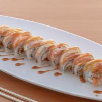 San Francisco · (Not spicy) Shrimp tempura, crab meat, topped with salmon and sliced lemons and unagi sauce.