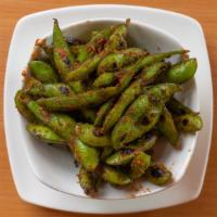 Spicy Edamame · Stir-fried soybeans with garlic and chili sauce.