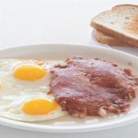 Corned Beef Hash · Three large eggs, corned beef hash, choice of toast.