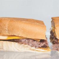 The Bullet · Huge hamburger patty, american cheese, 1000 island, ortega pepper, grilled onions on a frenc...