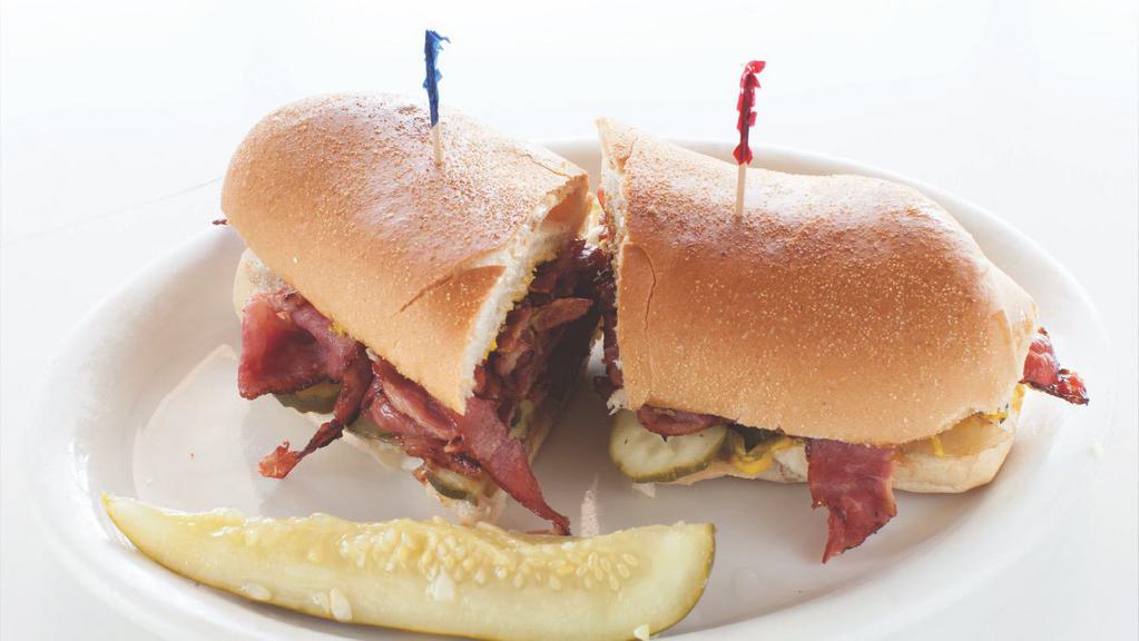 Pastrami Sandwich · Lots of pastrami with mustard, pickles, french bread.