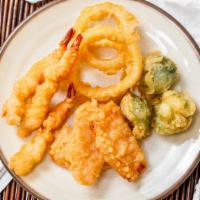 Shrimp Vegetable Tempura · It comes with our homemade  tempura sauce! It has, 3 shrimp , 3 onion rings, 3 carrots and 3...