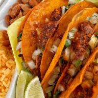 Combo Dorado · 4 Crispy Birria Tacos with rice and beans w/ small consome