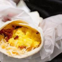 Breakfast Burrito · Bacon, sausage, three scrambled eggs, country potatoes, and Jack and Cheddar blend folded in...