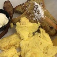 Country Breakfast · Sausage patties, country gravy, and three eggs served on top of fresh, hot biscuits. Served ...