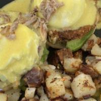 California Benedict · Two poached eggs, a toasted English muffin, four strips of bacon, tomatoes, and avocado. Top...