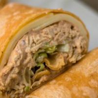 Buffalo Chicken Wrap · A whole wheat tortilla stuffed with fried chicken strips tossed with buffalo sauce, lettuce,...