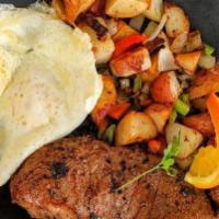 Ny Steak · 14 oz. choice NY steak, cooked to your liking over an open flame. Served with red potatoes a...