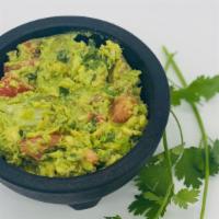 Guacamole Dip With One Avocado · Fresh mashed avocados with diced tomatoes, onions, cilantro, jalapeños, and lime juice.