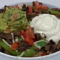 Burrito Bowl · Choice of chicken, beef (Asada) or carnitas, filled with rice, pinto beans, grilled fajita v...