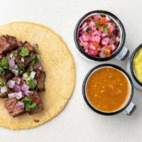 Carne Asada Taco · Handmade corn tortilla, angus steak (100% certified angus beef), cilantro, onions, guacamole...