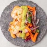 Shrimp Taco · Handmade corn tortilla, grilled shrimp, carrot, cucumber, guacamole & creamy morita salsa.