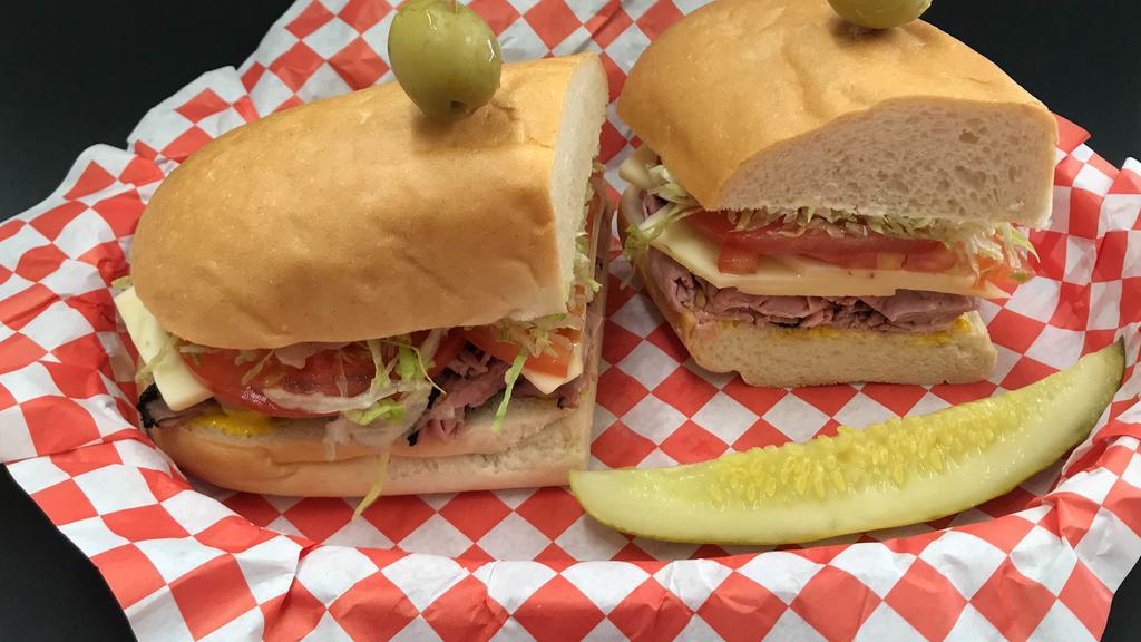 Rocky Balboa · Tender peppered roast beef stacked high on a soft roll with lettuce, tomato, mayo, mustard & pepper Jack cheese for that “Rocky” punch!