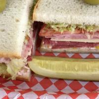 The Dagwood · Enough to fill the hungriest cartoon. Turkey, pepper rings, salami, jack cheese, & ham are t...