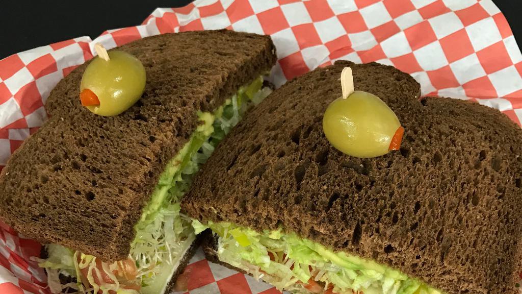 Lisa Simpson · A truly unique veggie sandwich with cream cheese, avocado, pepper rings, cucumber, sprouts, tomato, lettuce, & Italian dressing on dark sweet wheat.