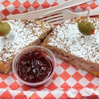 Wednesday-Monte Cristo · Turkey, ham, jack and cheddar grilled on sourdough bread with a sprinkle of powdered sugar a...