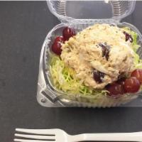 Chicken Salad Cup · Chicken salad on a bed of lettuce with fresh grapes.