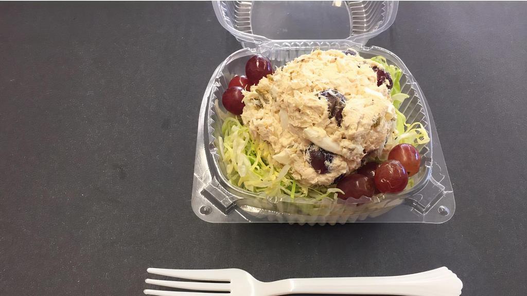 Chicken Salad Cup · Chicken salad on a bed of lettuce with fresh grapes.