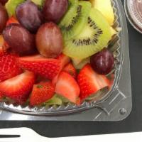 Fruit Salad · Honeydew, cantaloupe, oranges, pineapple, grapes, kiwi, & strawberries, served with poppy se...