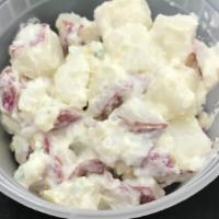 Potato Salad · Perfectly seasoned Yukon gold potato salad with mayo, a touch of mustard, & green onions. (N...
