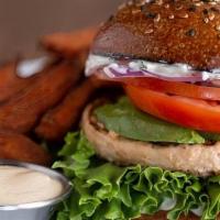Peri Peri Chicken Burger · Wild Alaskan salmon patty with housemade low-fat tzatziki, red onions, tomatoes, lettuce, an...
