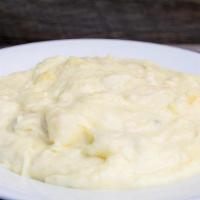 Garlic Mashed Potatoes (Gf) (V) · Yukon Gold potatoes mashed with butter, cream, and roasted garlic. Gluten-Free & Vegetarian.