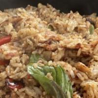 Spicy Fried Rice · Jasmine rice, roasted chili and garlic, egg, onion, red bell pepper, basil, and homemade bas...