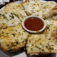 Cheese Bread (Full) · A unique blend of quattro, formaggio asiago and parmesan baked on 2 quartered French rolls (...