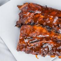 Slab Baby Back Ribs · Meaty Ribs smoked to perfection.
